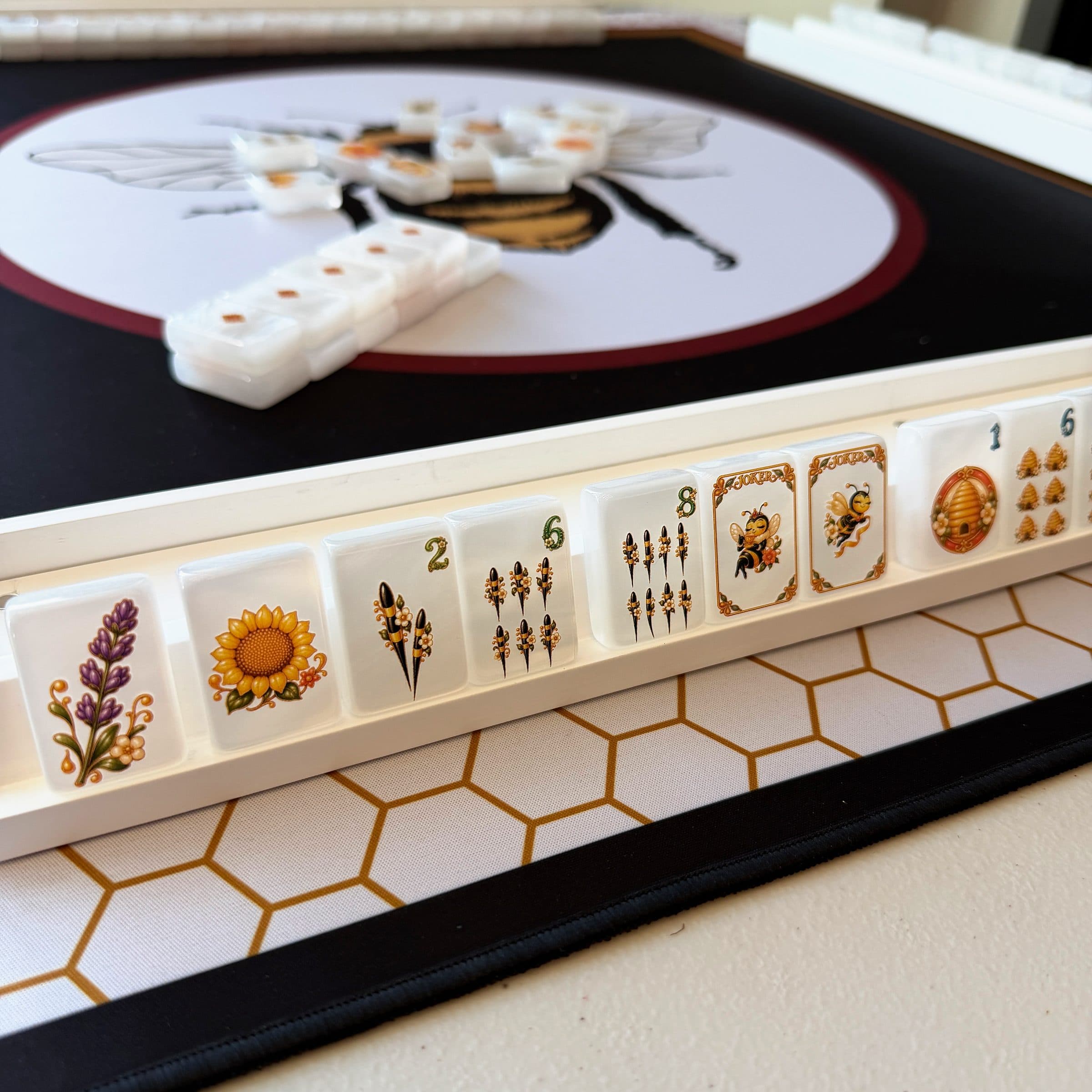 Printed tiles from a Snarky Tiles template standing in a rack.